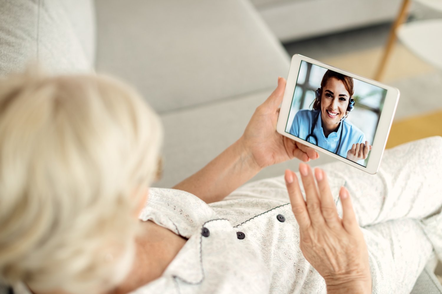 A Registered Nurse on a scheduled video check-in